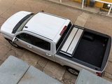 Access LOMAX Professional Series Hard Folding Tonneau Cover For 2019-2026 Chevrolet/GMC Silverado/Sierra 1500 & 2022 1500 LD/LTD 5'8" Bed — view 6 of 8